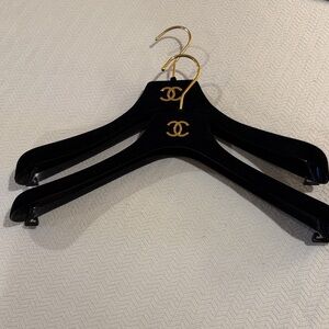 CHANEL Black Hangers with Gold Accents